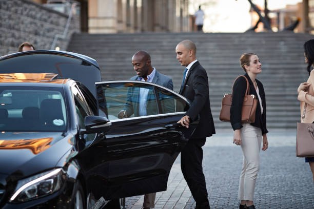 ValetOne chauffeur assisting clients into the car